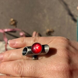 Macaroni Shaped Faux Ruby Star Stone With Brushed Silvertone Adjustable Ring